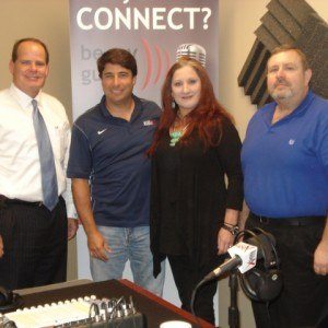 OPEN FOR BUSINESS: Bryan Ginn with GA-PCOM, Malinda Foster with Courtyard of Marriott-Mall of Georgia, and Randy Hicks with Merchant Data Systems