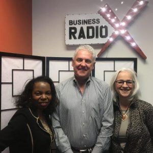 Holly Payton with IBM, Paula Washington with Paula Washington Enterprises, and Wayne Kurzen with Kurzen Group