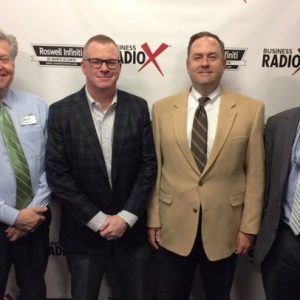 Jeff Petrea with Georgia Power, Thomas Heaton with the Small Business Development Center at Georgia State, and Bob Woosley with Frazier & Deeter