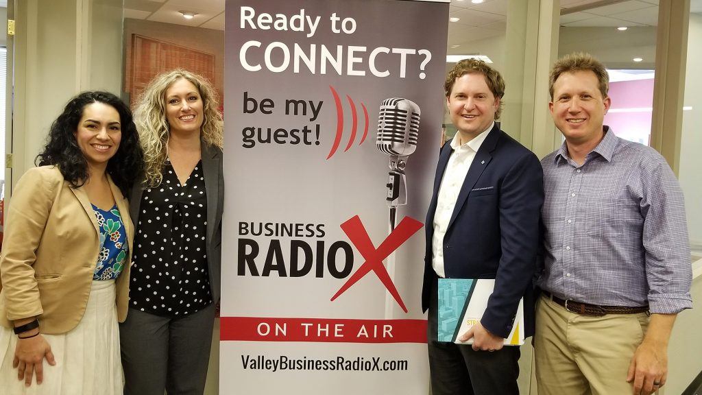 Lori Collins with the City of Phoenix, Denyse Airheart with the City of Maricopa, and Brad Vynalek with Quarles & Brady visit Valley Business RadioX in Phoenix, AZ