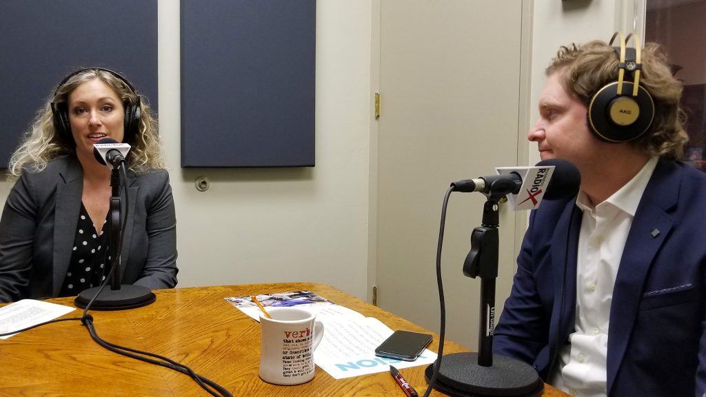 Lori Collins with the City of Phoenix and Brad Vynalek with Quarles & Brady in the studio at Valley Business RadioX in Phoenix, AZ