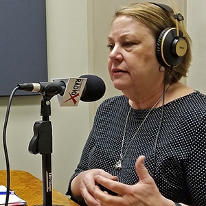 Susan de Queljoe in the studio at Valley Business RadioX in Phoenix, AZ