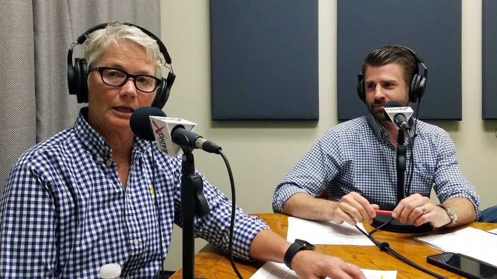 Ellen Clark with Heidi's Village and Fred Bueler with Chasse Building Team talking in the studio at Valley Business RadioX in Phoenix, Arizona