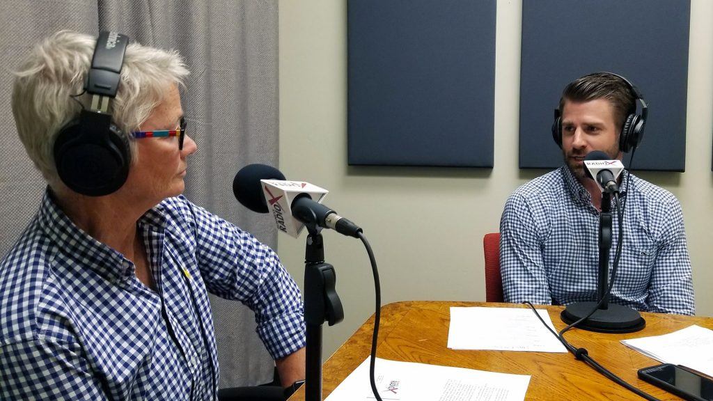 Ellen Clark with Heidi's Village and Fred Bueler with Chasse Building Team in the studio at Valley Business RadioX in Phoenix, Arizona