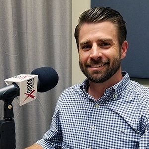 Fred Bueler with Chasse Building Team in the studio at Valley Business RadioX in Phoenix, Arizona