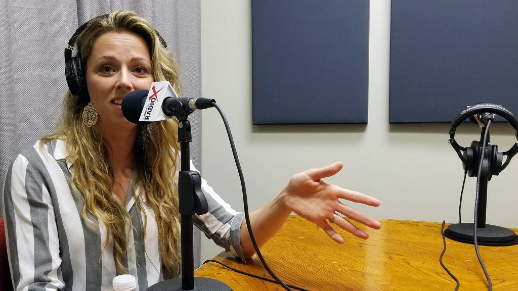 Shaina Weisinger with Repurpose House in the studio at Valley Business RadioX in Phoenix, Arizona