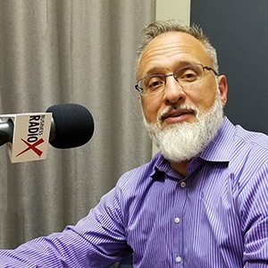 Linc Miller with Sandler Training in the studio at Valley Business RadioX in Phoenix, Arizona