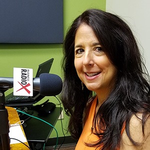 Karen Jacobson in the studio at Valley Business RadioX in Phoenix, Arizona