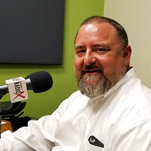 Phil Bradstock with the Phoenix Film Office in the studio at Valley Business RadioX in Phoenix, Arizona