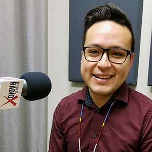 Brian Garcia with Tempe Union High School Districtin the studio at Valley Business RadioX in Phoenix, Arizona