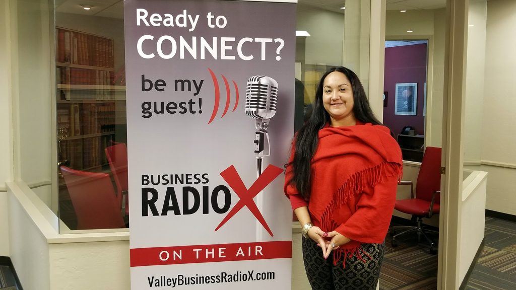 Natalia Ronceria Ceballos with La NRC visits the Valley Business RadioX studio in Phoenix, Arizona