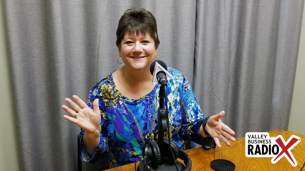 Abbie Fink with The Arizona 100 broadcasting live from the Valley Business RadioX studio in Phoenix, Arizona