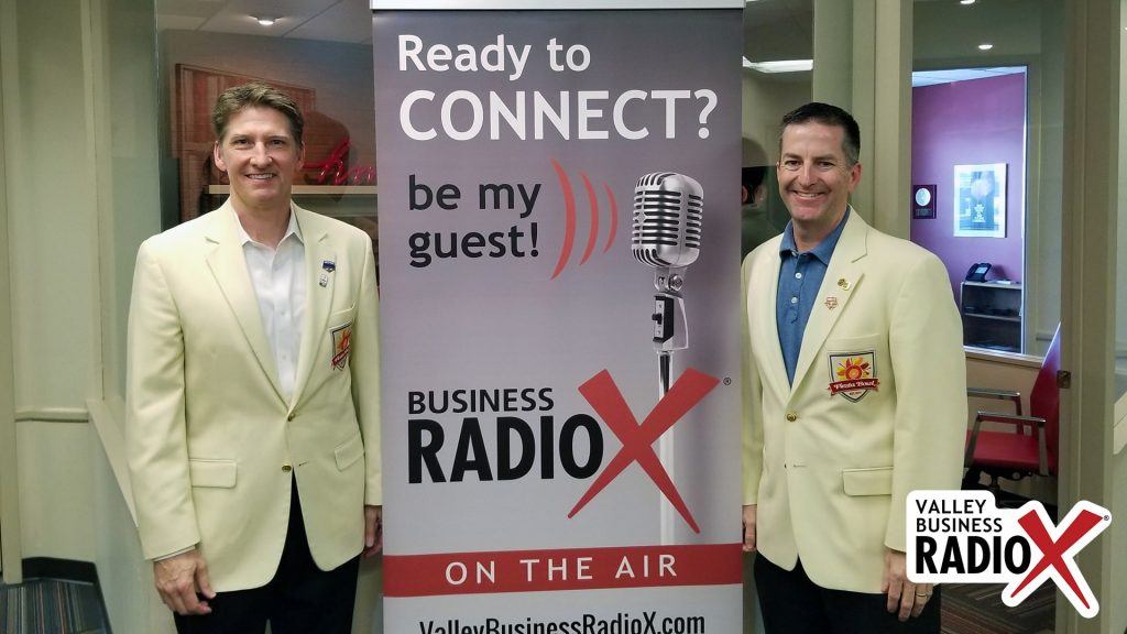 Mike Nealy and Patrick Barkley with the Fiesta Bowl visit the Valley Business RadioX studio in Phoenix, Arizona