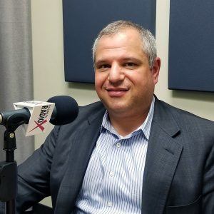 Dr. Roland Segal in the studio at Valley Business RadioX in Phoenix, Arizona