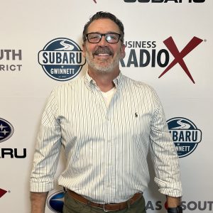 Gene Russell with Go Dawgs Roof Roof