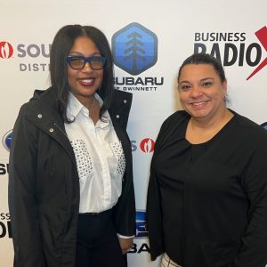 Marie Davis and Shantreal Moore with WoodSpring Suites Buford